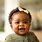 Black Baby Girl Smiling