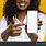 Black Woman Holding Phone