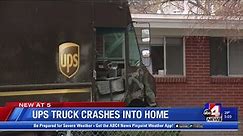 UPS Truck crashes into home