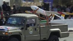 Iran parades 'longest-range' drone on Iraq war date