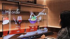 Crazy transparent OLED concept TVs