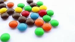 colorful candies on white background, chocolate candy