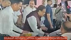 Mukesh Ambani serves traditional Gujarati food to villagers