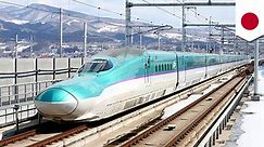 Japanese bullet train runs with an open door while going 280 kph