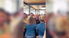 Apple's Tim Cook surprises customers, staff in Madrid