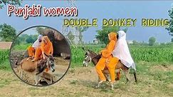 Punjabi women double donkey riding in village