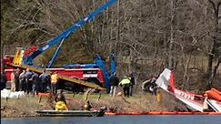 Salvage crews haul plane out of Andover lake
