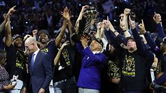 Commissioner Adam Silver presents Larry O'Brien Trophy to Nuggets