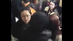 Heroic Chinese officer's quick action nabs fraudsters in elevator showdown