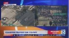 Breaking News: Anti-war protesters block freeway in downtown L.A.