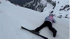 Woman Loses Ski and Falls While Attempting Trick With Fellow