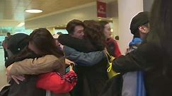 RAW: Athletes arrive home after narrowly missing Brussels terrorist attack