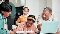 Grandparents, happy or education lesson by laptop in living room, communication tips or relax care. Senior people, girl or technology with cheering, studying or understanding school subject in house