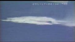 Space Shuttle SRB re-entry and splashdown in the ocean after launch