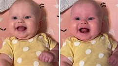 Joyful baby bursts into laughter during mom's talk