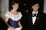 Elton John wife എന്നതിനുള്ള ഇമേജ് ഫലം. വലിപ്പം: 155 x 100. ഉറവിടം: www.nme.com