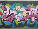 Image result for Graffiti. Size: 131 x 100. Source: commons.wikimedia.org
