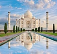 Image result for Taj Mahal Sunrise. Size: 113 x 106. Source: www.istockphoto.com