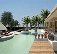 Image result for The Syntopia Crete. Size: 193 x 185. Source: hotelierandhospitality.com