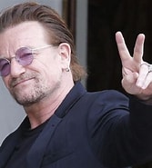 Image result for Bono. Size: 167 x 185. Source: www.thefamouspeople.com