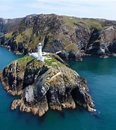 Image result for Faro Di South Stack. Size: 165 x 185. Source: www.menaiholidays.co.uk