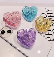 Risultato immagine per Luxury Bling Diamond Love Heart Phone Grip Tok Griptok Corea Holder Per Iphone 14 Pro Accessori. Dimensioni: 176 x 185. Fonte: www.aliexpress.com