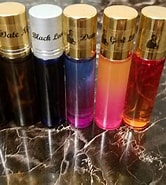 Image result for Scentsy – Exotic Escape Inspired by Alien Roll On Perfume Oil 10ml - Premium Quality, Long Lasting Attar Fragrance for Women. Size: 166 x 185. Source: www.etsy.com