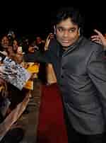 Image result for A R Rahman long hair. Size: 150 x 202. Source: www.imdb.com