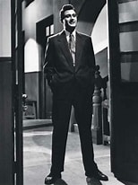 تصویر کا نتیجہ برائے Dev Anand in Black Suit. سائز: 154 x 206۔ ماخذ: www.geo.tv