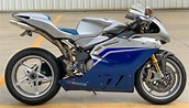 Image result for MV Agusta F4 Series engine. Size: 172 x 98. Source: iconicmotorbikeauctions.com