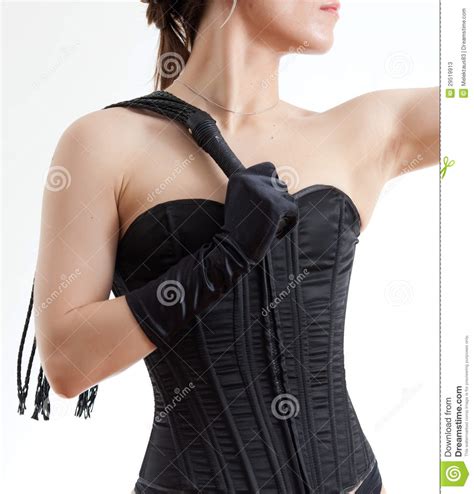 woman in a corset and whip stock image image 29519913