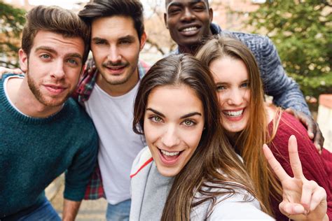 Group Of Friends Having Fun Together Outdoors Bare International