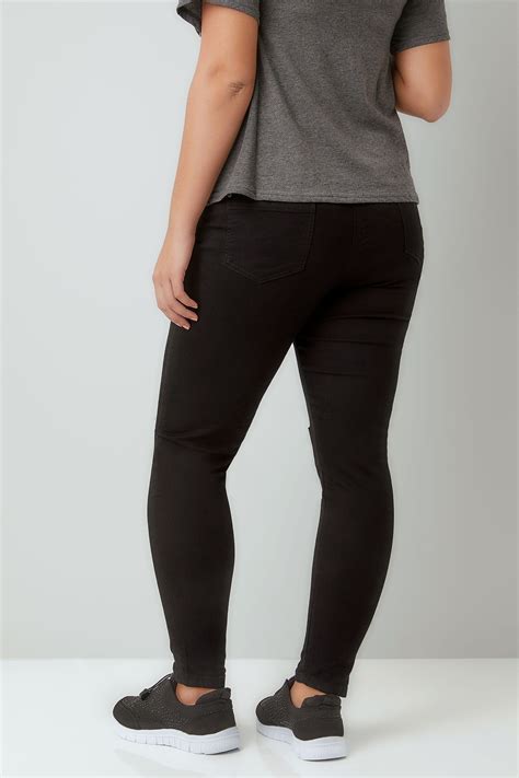 black super stretch skinny jeans with ripped knees plus