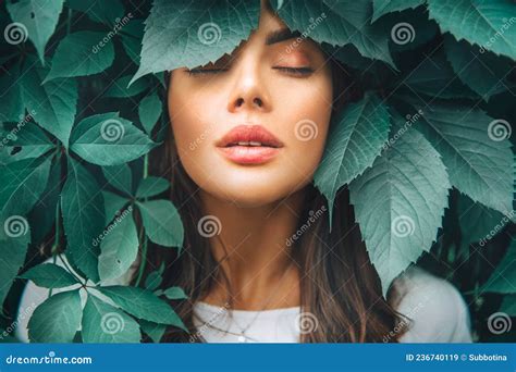 beautiful fashion model girl enjoying nature breathing fresh air in