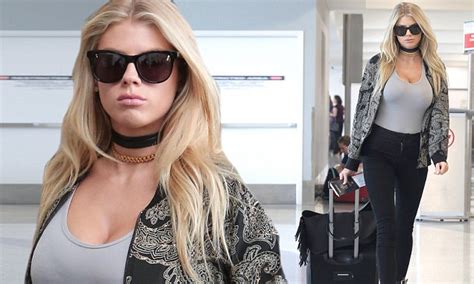 charlotte mckinney is all style in lax as she pairs tight bodysuit with patterned jacket daily