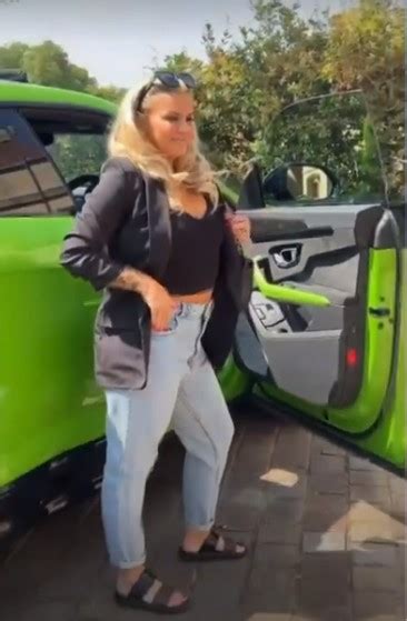 kerry katona shows off her incredible curves as she poses in front of