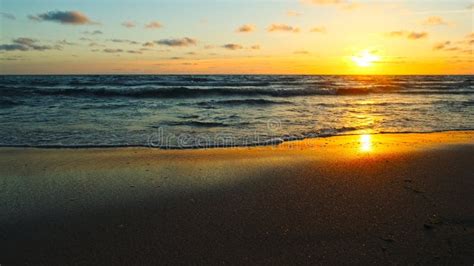 beautiful sandy beach while sunset beautiful seascape of a sandy beach