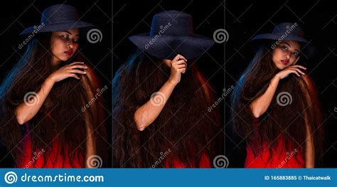 asian girl long curly hair lip wear blue hat stock image