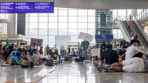 hong kong airport resumes operations  court injunction limiting
