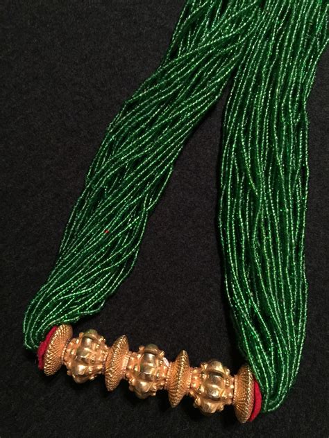 tilhari nepalese women s necklace green glass beads felt pads and