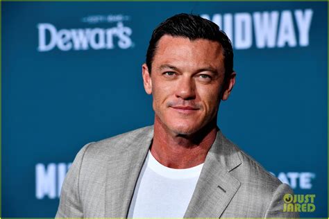Luke Evans Shows Off His Rainbow Pants In A Shirtless Pride Photo