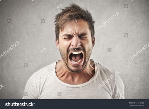 portrait young man screaming stock photo  shutterstock