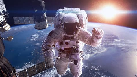 astronaut wallpaper  earth sun space suit space