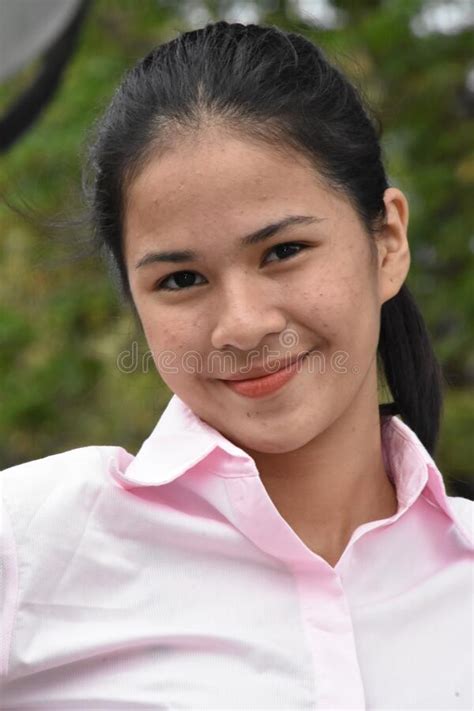 Beautiful Filipina Teenage Female And Happiness Wearing Pink Shirt