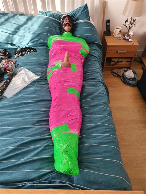 mummification   nice pink green duct tape mummy nom rmummificationbondage