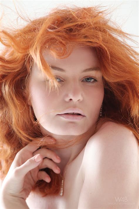 pale redhead teen barbara babeurre slips off her white dress to model naked