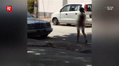 woman believed to be in her 20s seen walking naked around