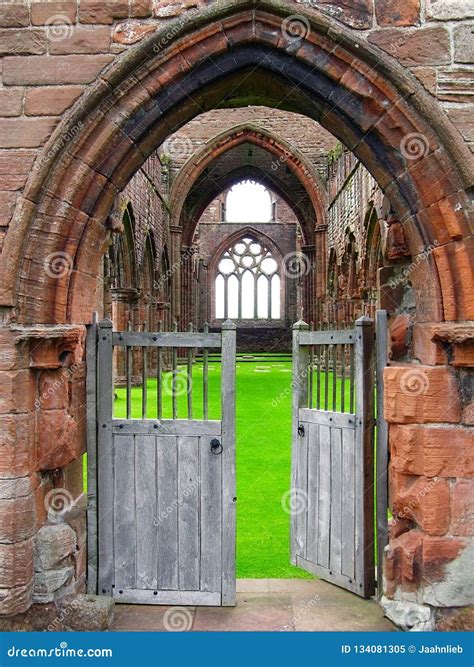 sweetheart abbey  open entrance gate   ruins  abbey