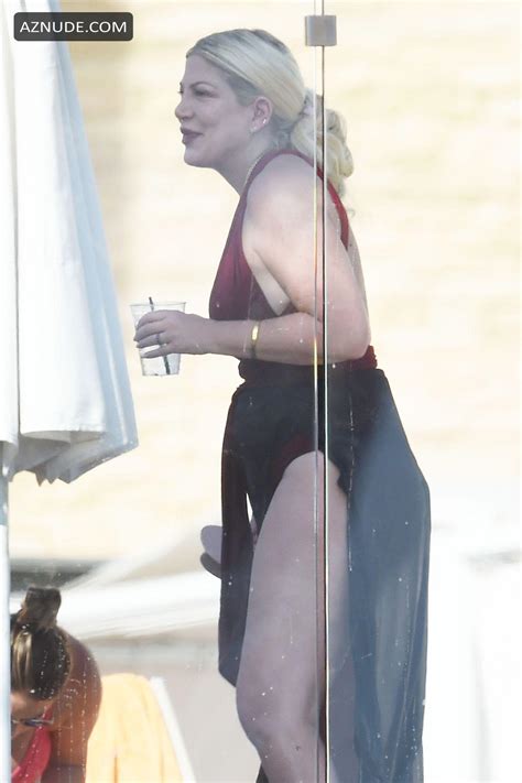 tori spelling sexy seen in her swimsuit with dean mcdermott aznude