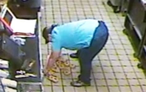 manager at dunkin donuts drops tray full of donuts on